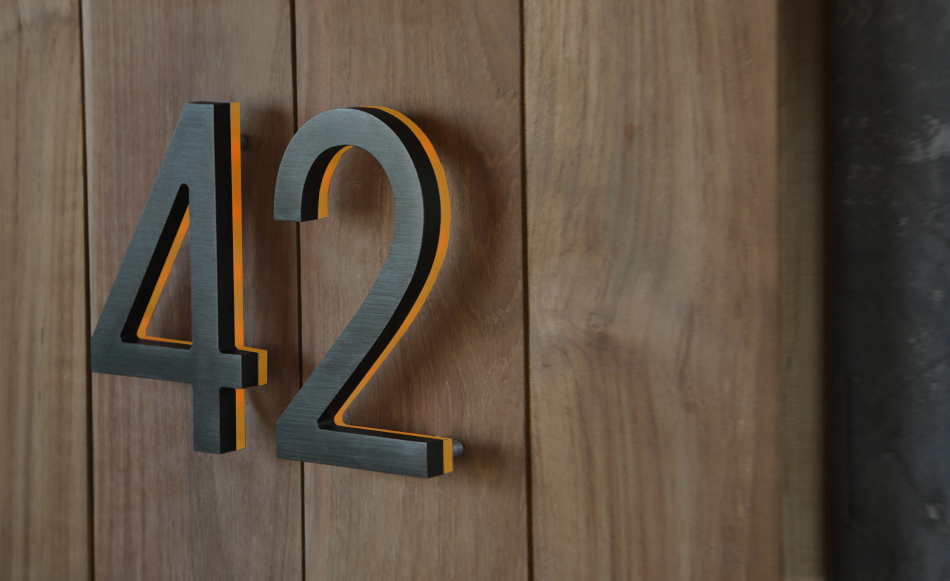 Modern Bronze House Numbers Illuminated by Luxello LED Signage Modern Bronze House Numbers Illuminated by Luxello LED Signage